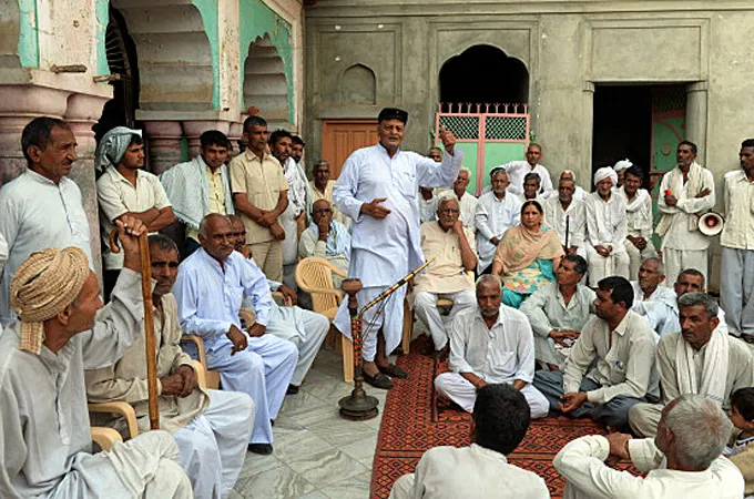 Village councils have often been blamed for supporting severe punishments. [Sajjad Hussain/AFP/Getty Images]