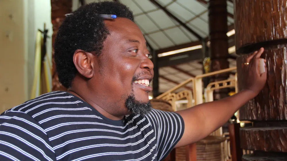 Ashim Nwoko is Demas' son and an artist and builder in his own right [Femke van Zeijl/Al Jazeera]