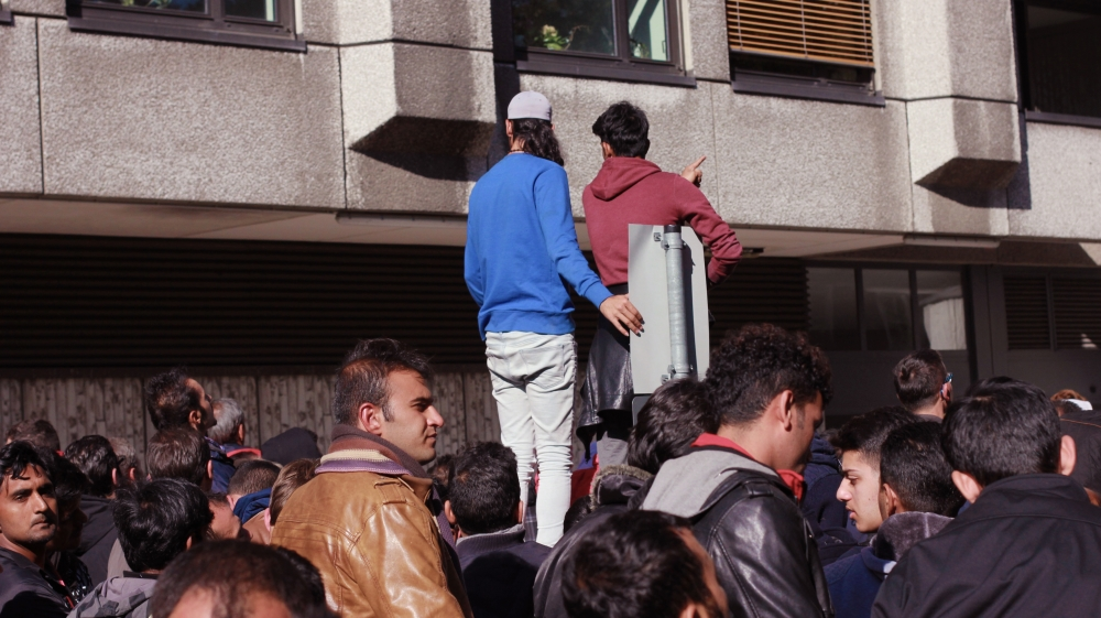 German authorities are struggling to cope with the huge influx of refugees [Ash Gallagher/Al Jazeera]