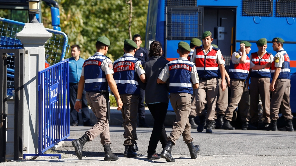 An unidentified soldier accused of attempting to assassinate Turkish President Tayyip Erdogan on the night of the failed last year''s July 15 coup, is escorted by gendarmes