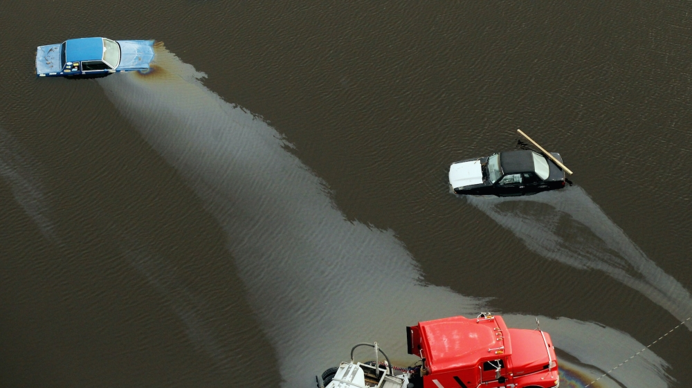 Partially submerged cars are seen in Hurricane Isaac’s flood waters on August 31, 2012 in Plaquemines Parish, Louisiana