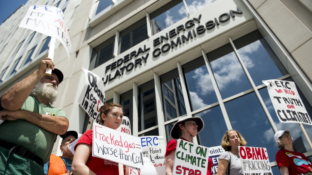 Members of the Chesapeake Climate Action Network picket outside of the Federal Energy Regulatory Commission in Washington, DC to protest against fracked gas exports and the liquified natural gas export facility at Cove Point in Maryland in 2014
