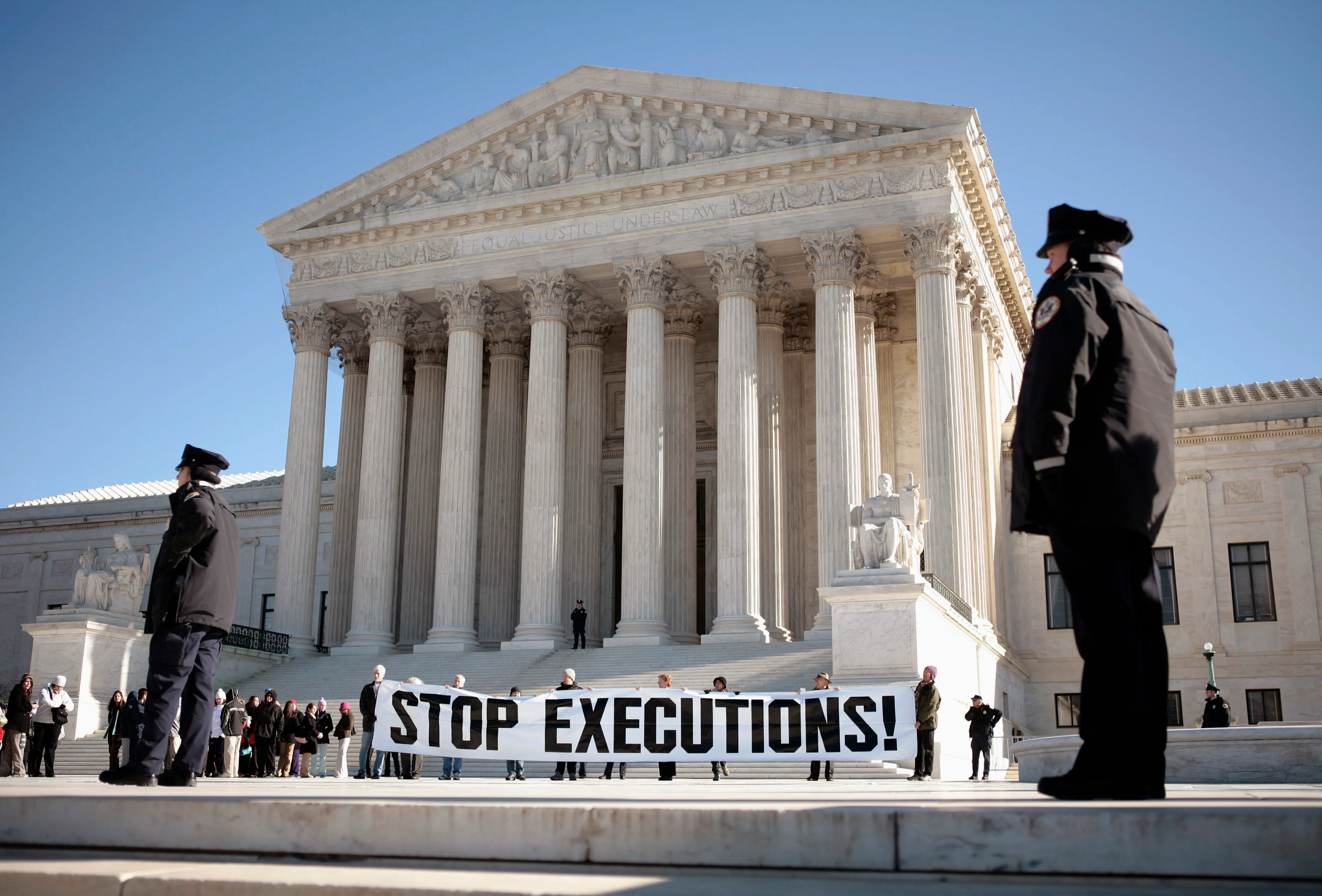 Protesters calling for an end to the death penalty unfurl a banner outside the U.S. Supreme Court in Washington in January 2007.