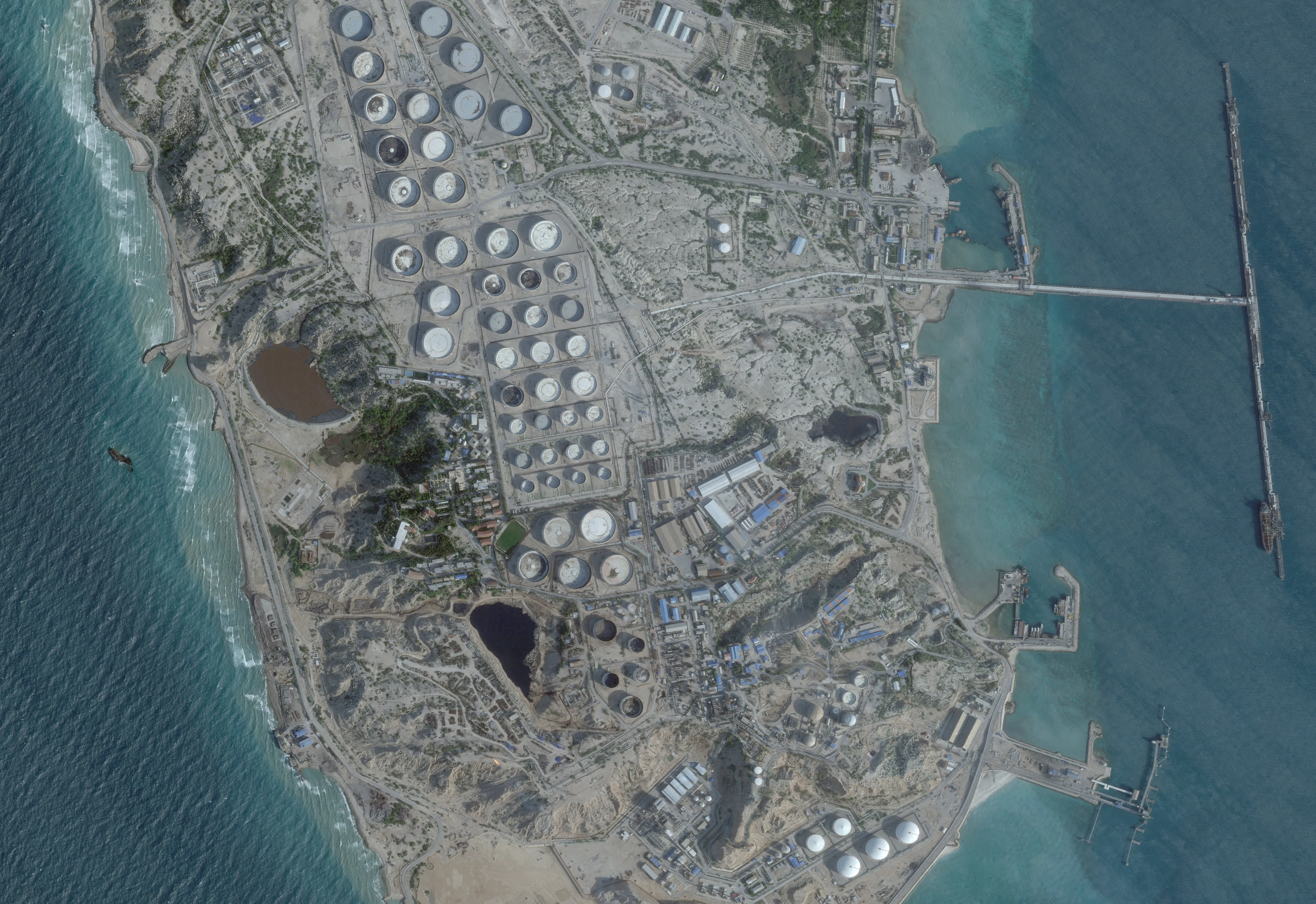 FILE PHOTO: A satellite image shows an oil terminal at Kharg Island, Iran, February 25, 2026. 2026 Planet Labs PBC/Handout via REUTERS THIS IMAGE HAS BEEN SUPPLIED BY A THIRD PARTY. MANDATORY CREDIT/File Photo